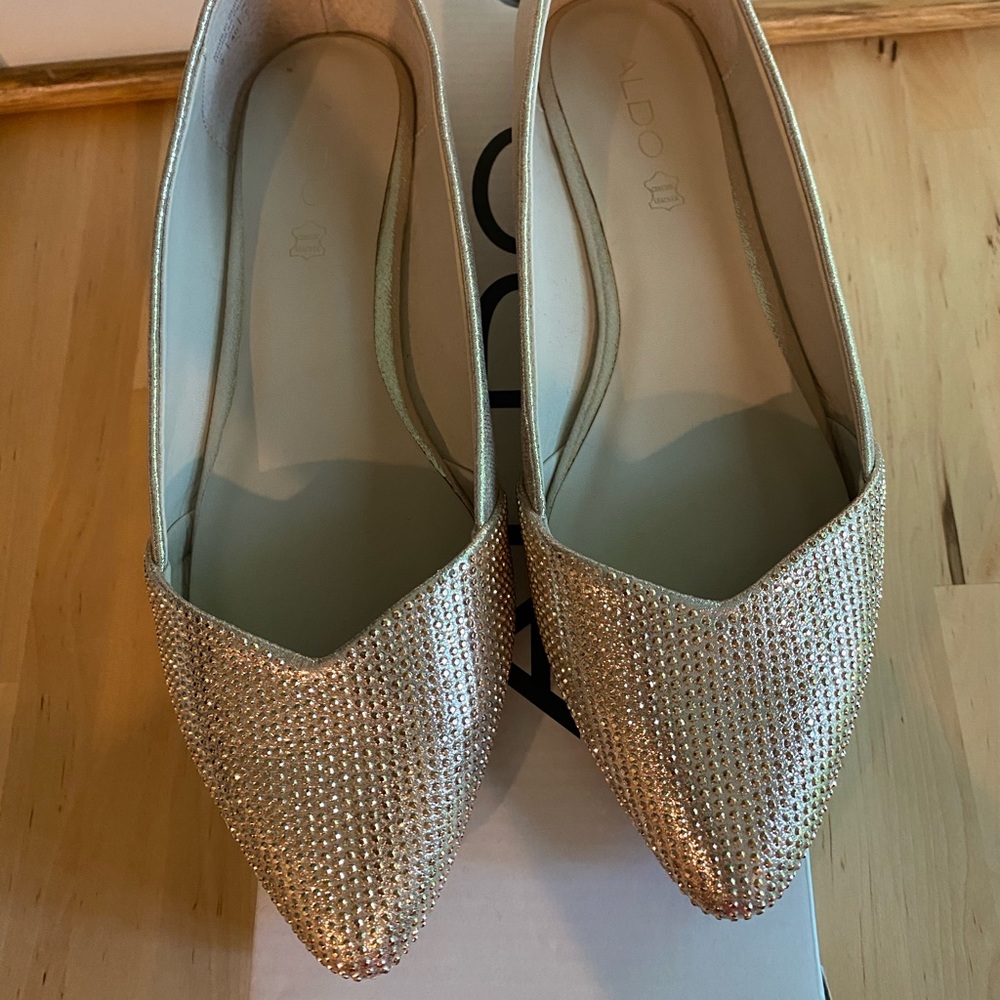 Gold ALDO pointed flats - size 9